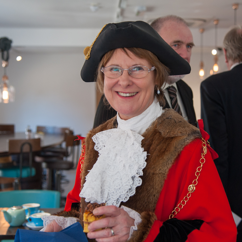 Julia Wakelam, Mayor of Bury St Edmunds, sampling the refreshments at the Beer Cafe after the unveiling of the St Edmund's Crown sculpture